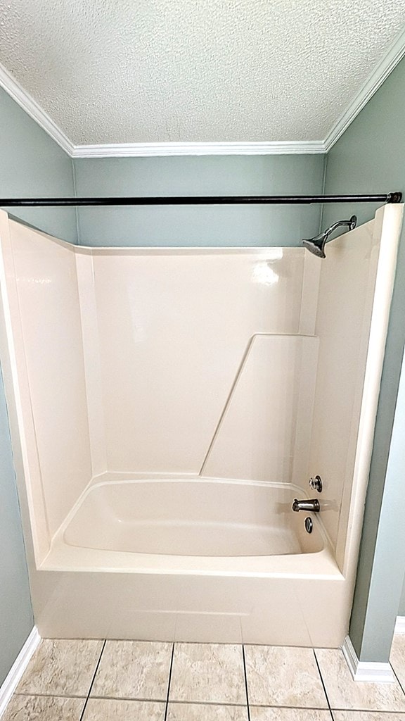 5 Walford Pl, Dothan, AL 36301 - bathroom featuring a textured ceiling, crown molding, tile patterned flooring, and shower / bath combination