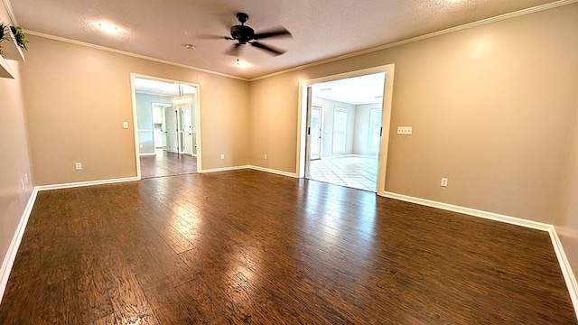 5 Walford Pl, Dothan, AL 36301 - spare room featuring dark wood-type flooring, ceiling fan, ornamental molding, and a textured ceiling