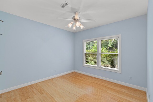 707 Edinburgh Way, Dothan, AL 36305 - unfurnished room featuring light wood-style floors, baseboards, a ceiling fan, and visible vents