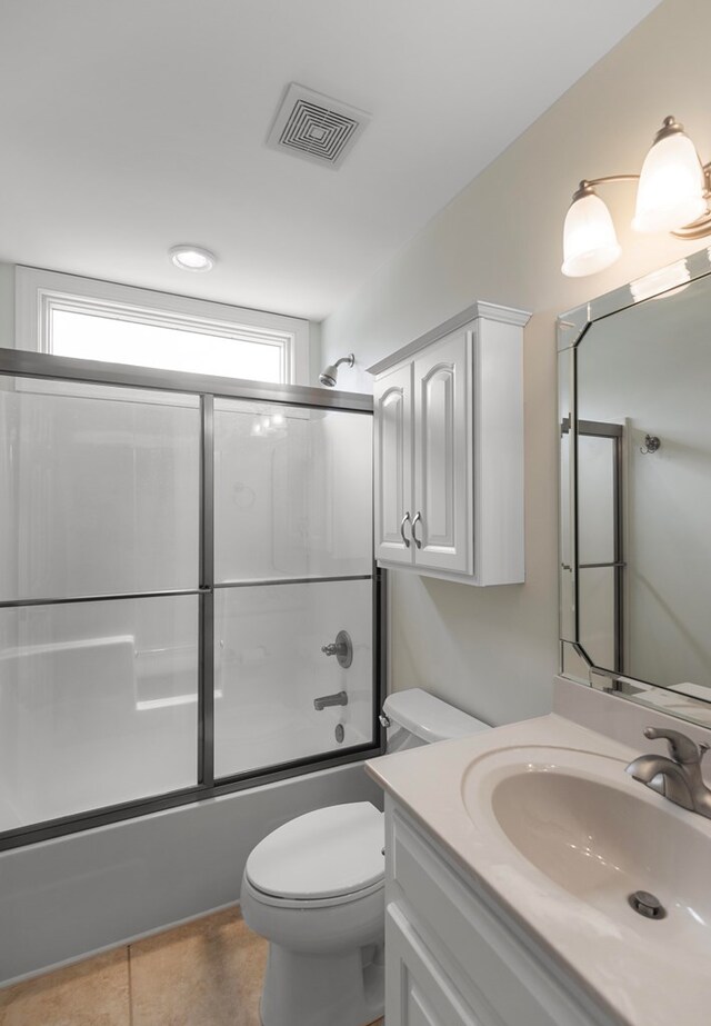 707 Edinburgh Way, Dothan, AL 36305 - bathroom featuring vanity, plenty of natural light, enclosed tub / shower combo, and visible vents