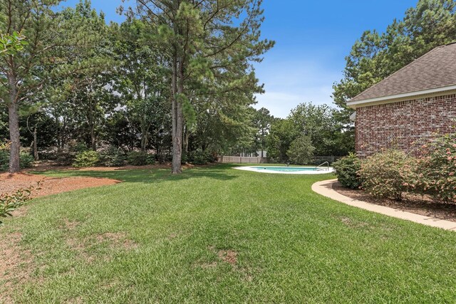 707 Edinburgh Way, Dothan, AL 36305 - view of yard featuring a fenced in pool and fence