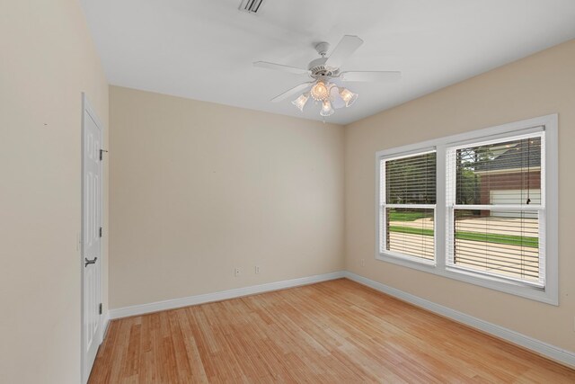 707 Edinburgh Way, Dothan, AL 36305 - spare room featuring light wood-style floors, a ceiling fan, baseboards, and visible vents