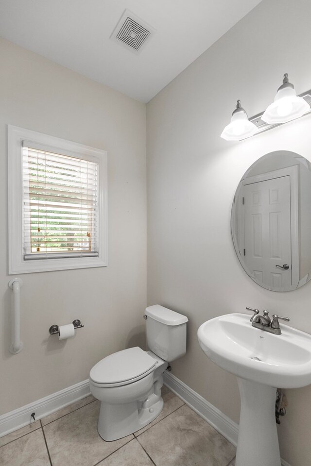 707 Edinburgh Way, Dothan, AL 36305 - bathroom featuring baseboards, tile patterned flooring, toilet, and visible vents