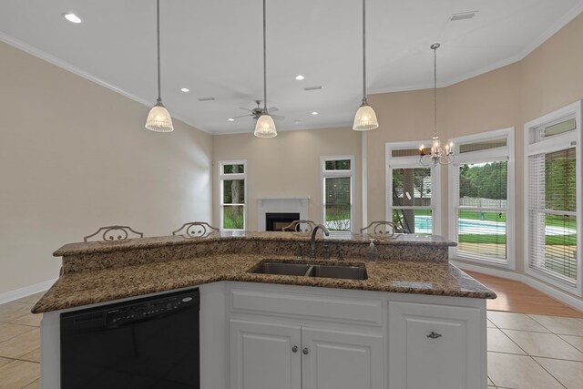 707 Edinburgh Way, Dothan, AL 36305 - kitchen with a fireplace, dishwasher, a sink, ornamental molding, and light tile patterned flooring
