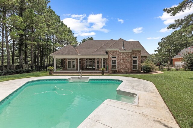 707 Edinburgh Way, Dothan, AL 36305 - view of swimming pool featuring fence, a patio, french doors, a fenced in pool, and a lawn