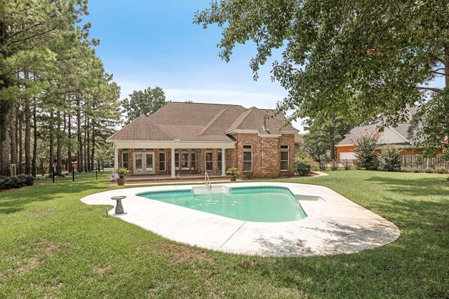 707 Edinburgh Way, Dothan, AL 36305 - view of swimming pool with a lawn, a patio, a fenced in pool, and french doors