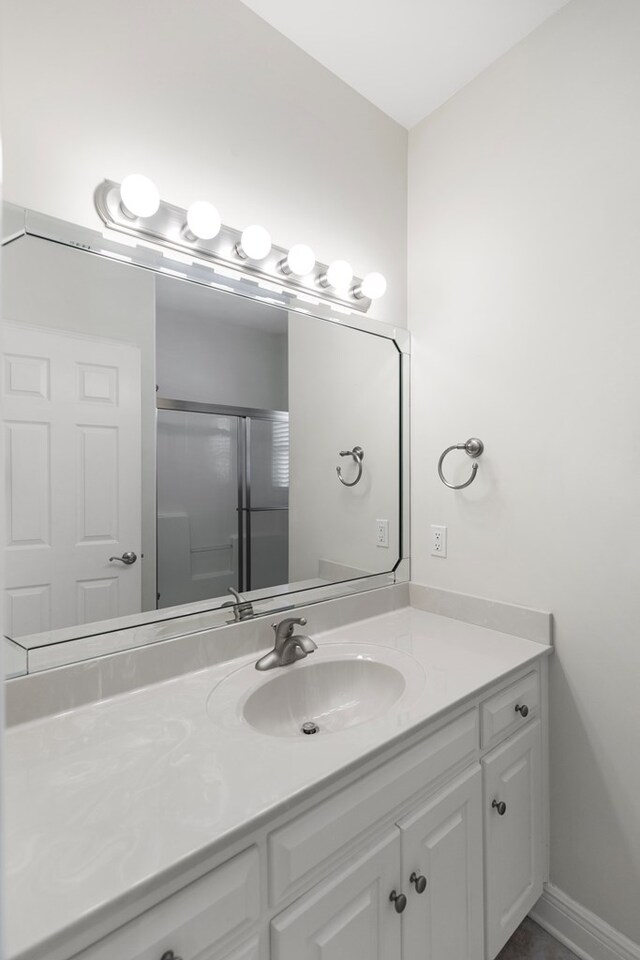 707 Edinburgh Way, Dothan, AL 36305 - bathroom with vanity and an enclosed shower