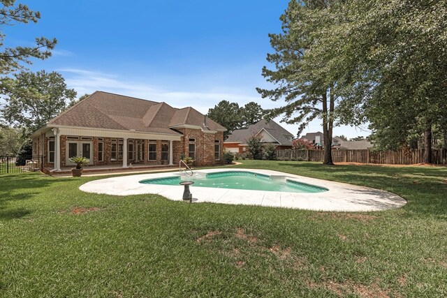 707 Edinburgh Way, Dothan, AL 36305 - view of swimming pool with fence, a fenced in pool, french doors, a patio, and a yard