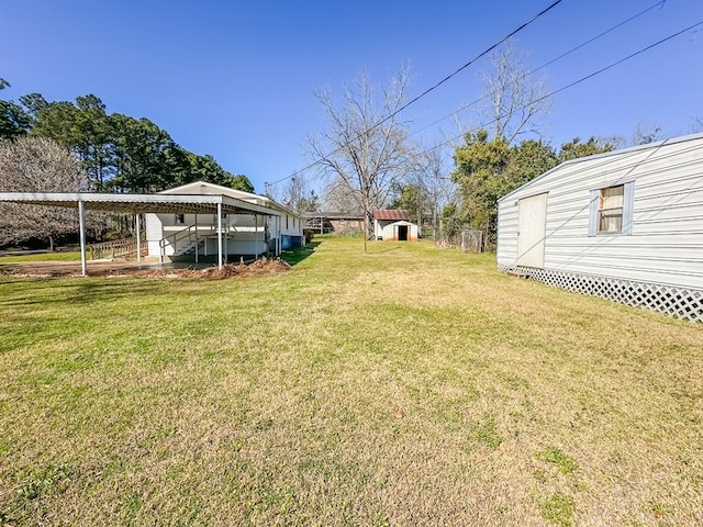 view of yard featuring an outbuilding and a shed