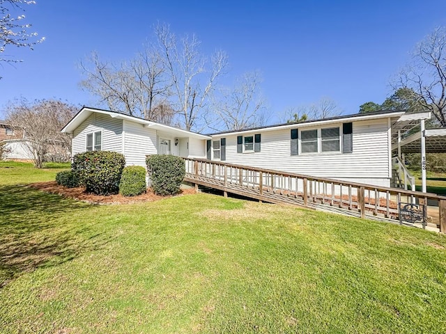163 S Railroad St, Coffee Springs, AL 36318 - rear view of property featuring a lawn and a deck