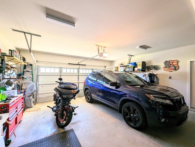 garage featuring a garage door opener