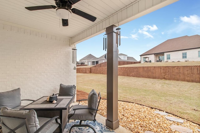 view of patio with ceiling fan