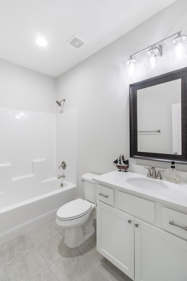 full bathroom featuring vanity, tile patterned floors, tub / shower combination, and toilet