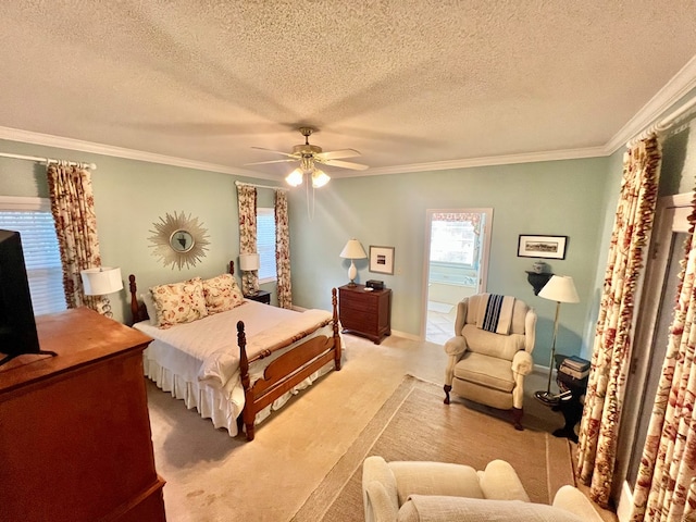 508 N Englewood Ave, Dothan, AL 36303 - bedroom featuring ornamental molding, light carpet, a textured ceiling, and ceiling fan