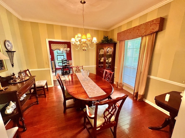508 N Englewood Ave, Dothan, AL 36303 - dining area with a chandelier, plenty of natural light, ornamental molding, dark wood-type flooring, and wallpapered walls
