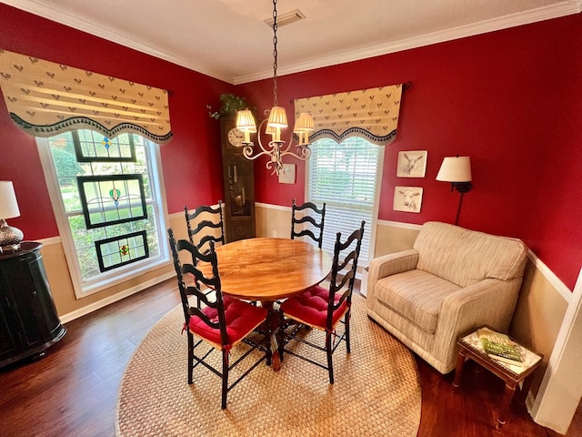 508 N Englewood Ave, Dothan, AL 36303 - dining space with a chandelier, wood finished floors, and ornamental molding