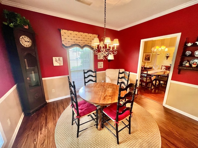 508 N Englewood Ave, Dothan, AL 36303 - dining room featuring a chandelier, wood finished floors, and ornamental molding