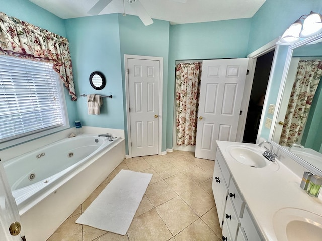 508 N Englewood Ave, Dothan, AL 36303 - bathroom featuring a jetted tub, double vanity, tile patterned flooring, and a ceiling fan