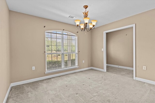 4808 Crystal Springs Rd, Red Level, AL 36474 - empty room with carpet, visible vents, baseboards, and an inviting chandelier