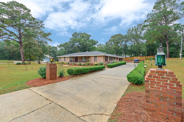 view of home's community with a lawn