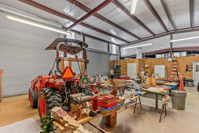 garage with a workshop area