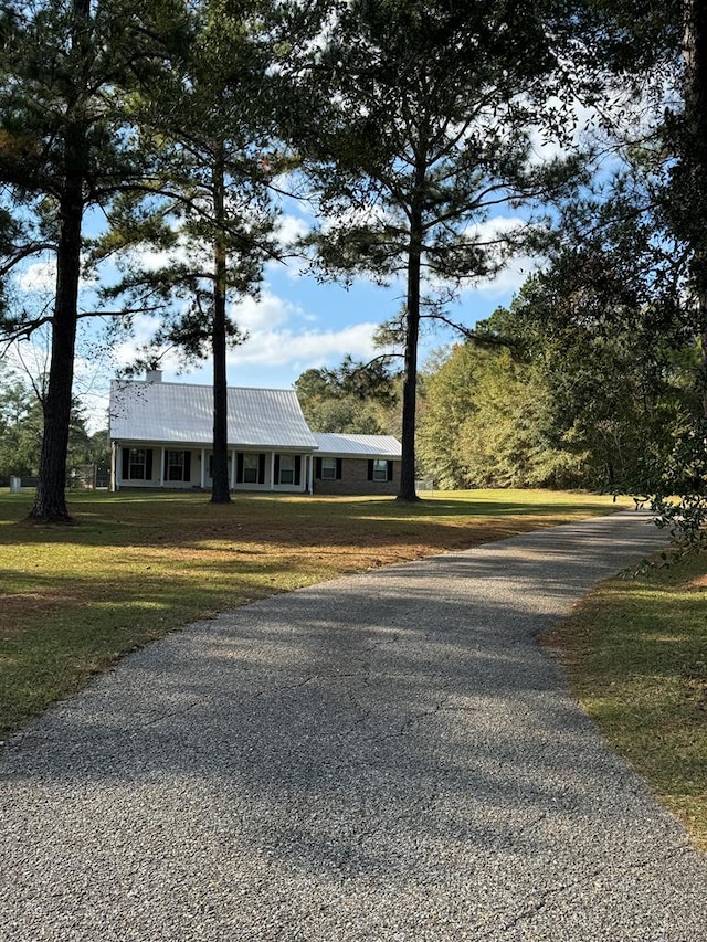 view of front of home with a front lawn