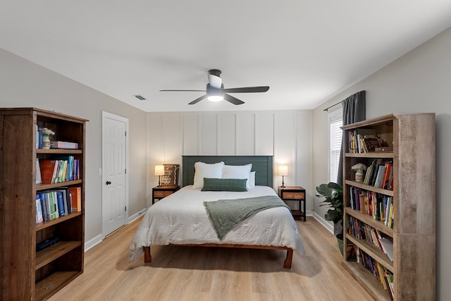 bedroom featuring ceiling fan and light hardwood / wood-style flooring