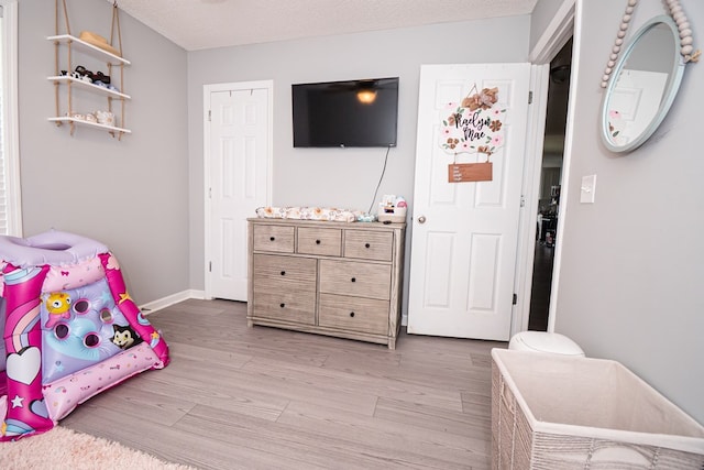 52 Oakwood Dr, Midland City, AL 36350 - bedroom featuring wood finished floors and baseboards