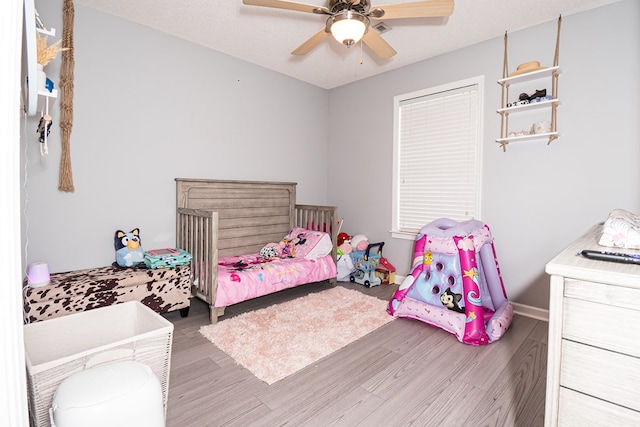 52 Oakwood Dr, Midland City, AL 36350 - bedroom featuring wood finished floors and a ceiling fan