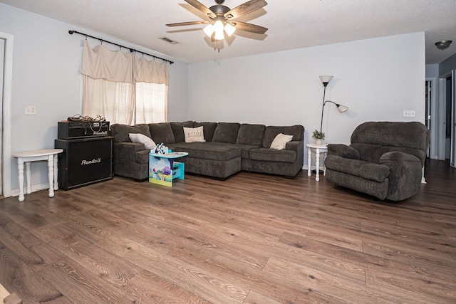52 Oakwood Dr, Midland City, AL 36350 - living area with wood finished floors and ceiling fan