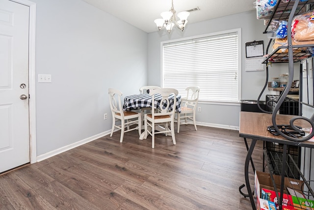 52 Oakwood Dr, Midland City, AL 36350 - dining space with wood finished floors and a chandelier