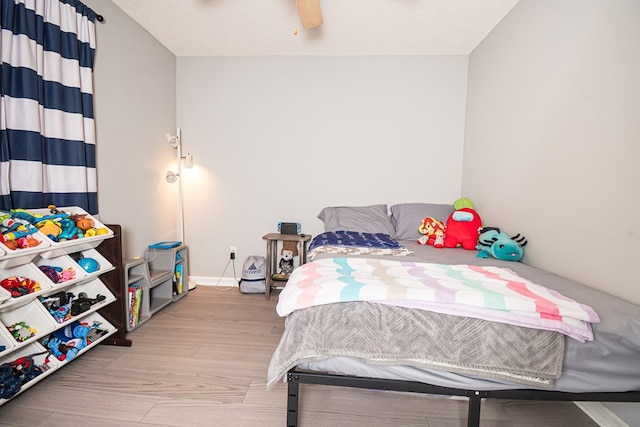 52 Oakwood Dr, Midland City, AL 36350 - bedroom featuring a ceiling fan and baseboards