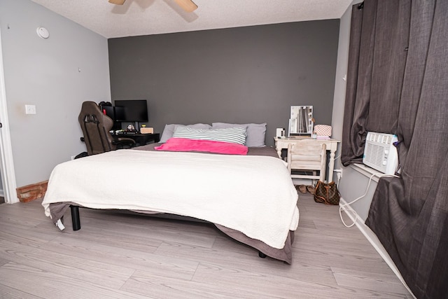 52 Oakwood Dr, Midland City, AL 36350 - bedroom featuring wood finished floors and a ceiling fan