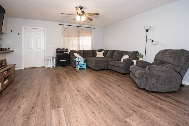 52 Oakwood Dr, Midland City, AL 36350 - living area with a ceiling fan and wood finished floors