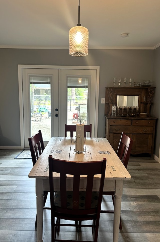 1712 Sowell Rd, Brewton, AL 36426 - dining room featuring wood-type flooring, ornamental molding, and french doors