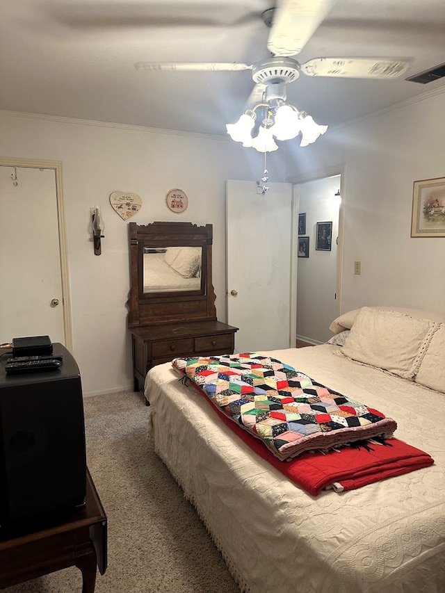 1712 Sowell Rd, Brewton, AL 36426 - bedroom featuring ceiling fan, crown molding, and carpet