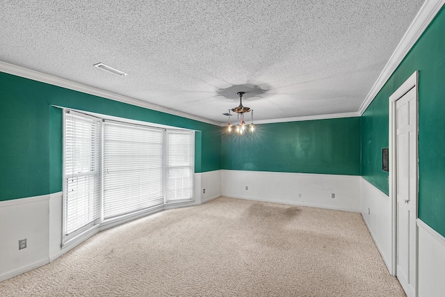 3408 Huntington Pl, Dothan, AL 36303 - unfurnished room with healthy amount of natural light, ornamental molding, a textured ceiling, and carpet flooring