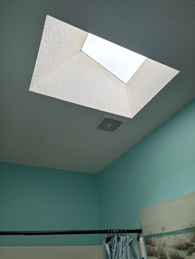 interior space featuring a skylight