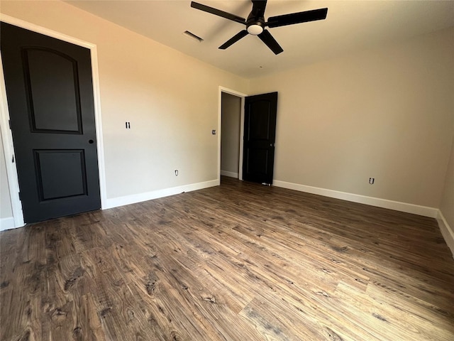 729 Sandstone Dr, Dothan, AL 36303 - unfurnished bedroom with dark wood-style flooring, baseboards, and ceiling fan