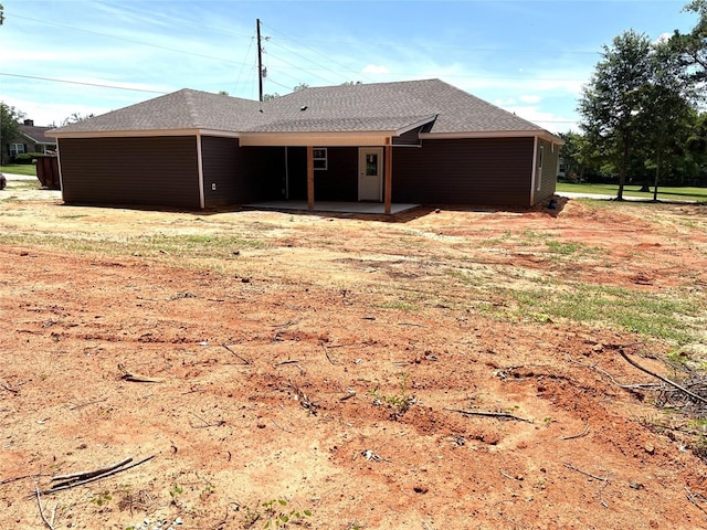 729 Sandstone Dr, Dothan, AL 36303 - rear view of property with a patio area and roof with shingles