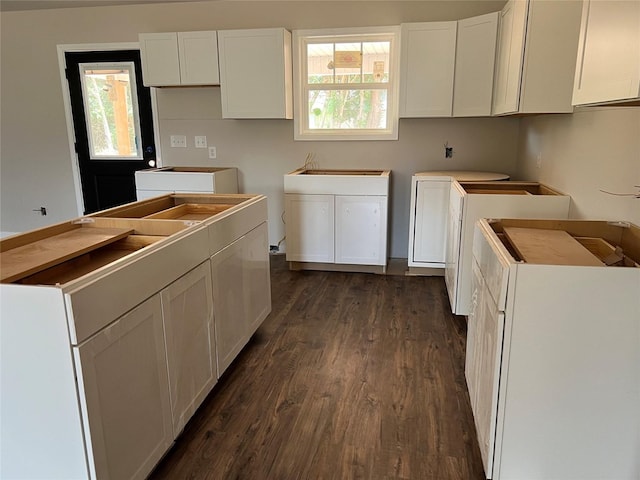 729 Sandstone Dr, Dothan, AL 36303 - kitchen with dark wood finished floors and white cabinetry