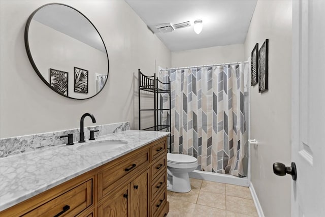 bathroom with tile patterned flooring, a shower with curtain, vanity, and toilet