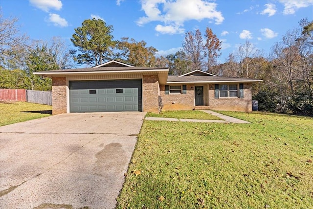 ranch-style home with a garage and a front yard