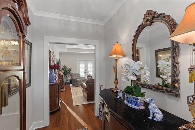 entrance foyer with dark hardwood / wood-style flooring, french doors, and crown molding