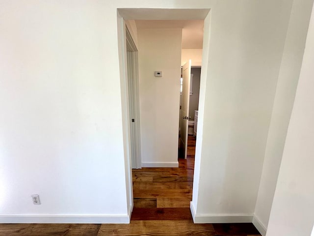 hall featuring dark hardwood / wood-style flooring