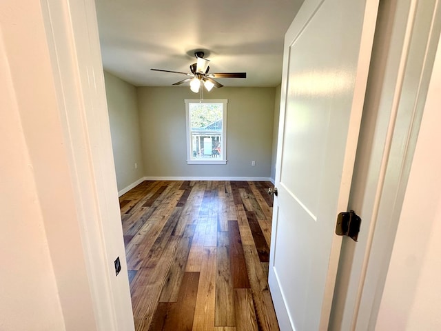 unfurnished room with ceiling fan and hardwood / wood-style floors