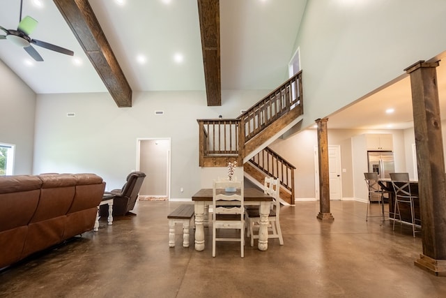 97 Eudon Best Rd, Ashford, AL 36312 - dining room with finished concrete flooring, a ceiling fan, beam ceiling, baseboards, and stairway