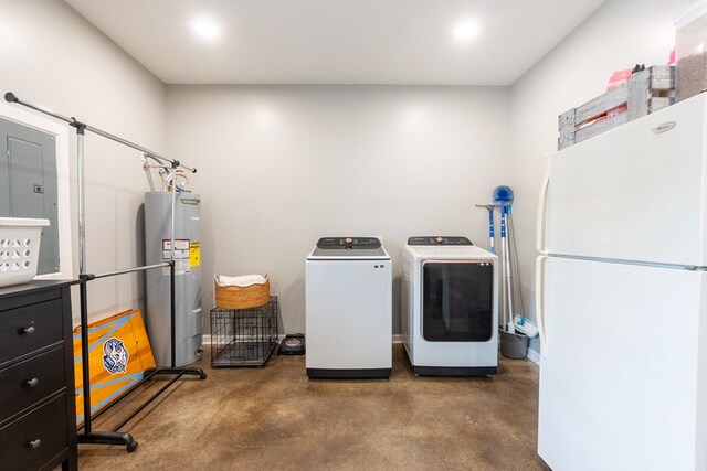97 Eudon Best Rd, Ashford, AL 36312 - washroom with water heater and washing machine and dryer