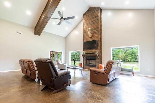97 Eudon Best Rd, Ashford, AL 36312 - living area featuring concrete flooring, high vaulted ceiling, baseboards, a stone fireplace, and a ceiling fan