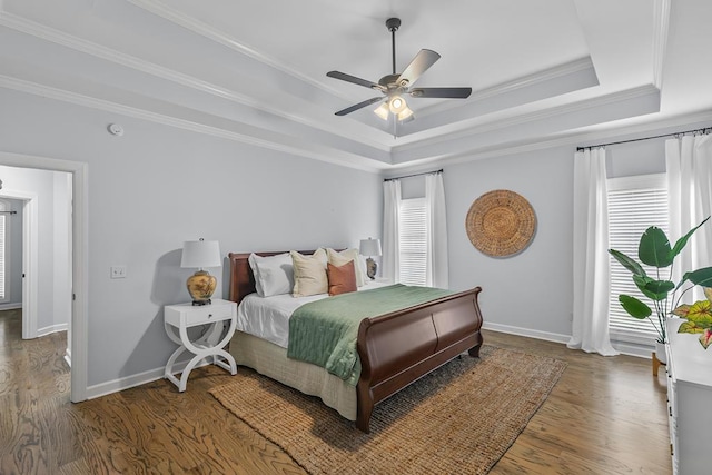 401 Gladstone Way, Dothan, AL 36303 - bedroom with multiple windows, wood finished floors, a raised ceiling, crown molding, and ceiling fan